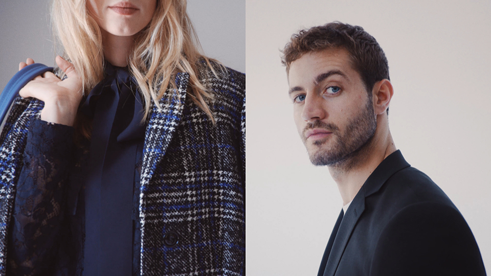 close up of blonde female model wearing a squared jacket, male model with black jacket looking into camera
